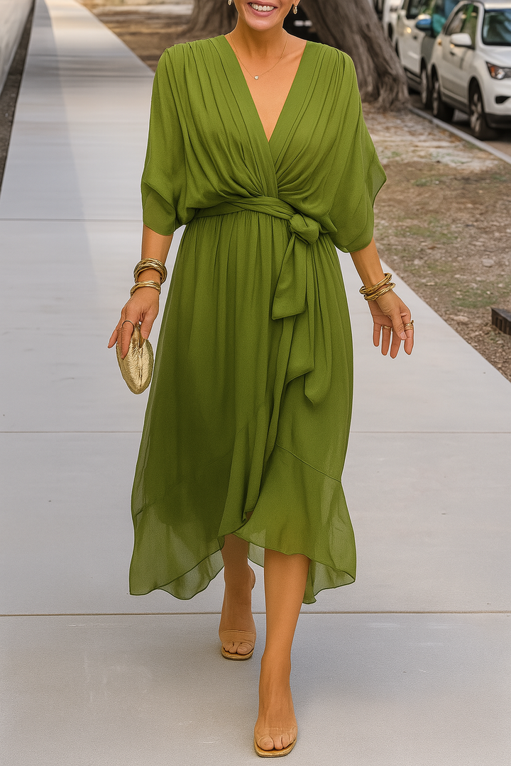 Robe midi portefeuille femme élégante avec col V et ourlet asymétrique fluide. Parfaite pour l'été chic.