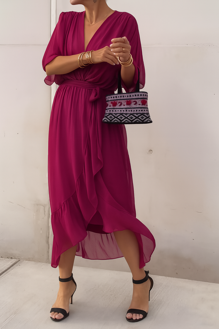 Vêtement femme : robe midi élégante à col V, coupe portefeuille et ourlet asymétrique, très confortable.
