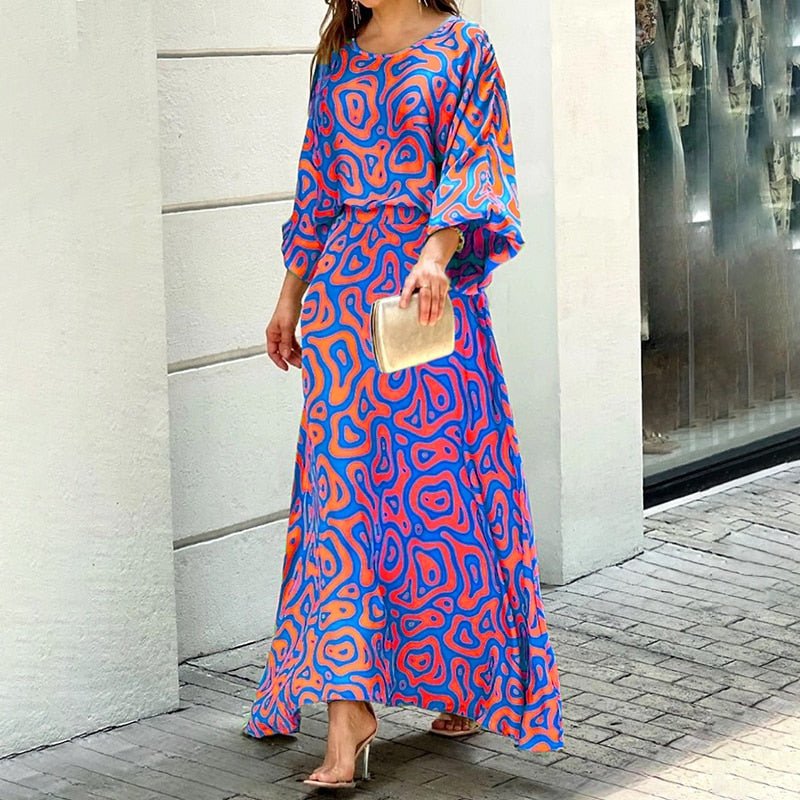 "Robe midi pour femme en tissu respirant mauve, coupe flatteuse, pour journées chaudes, élégance et confort assurés."