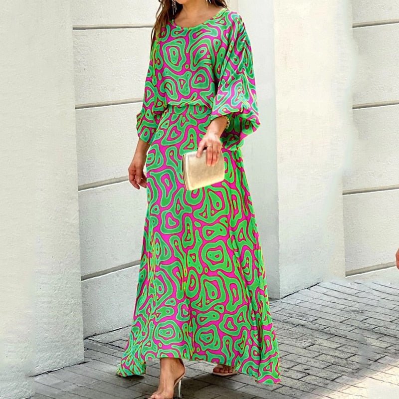 "Robe midi pour femme en tissu respirant mauve, coupe flatteuse, pour journées chaudes, élégance et confort assurés."