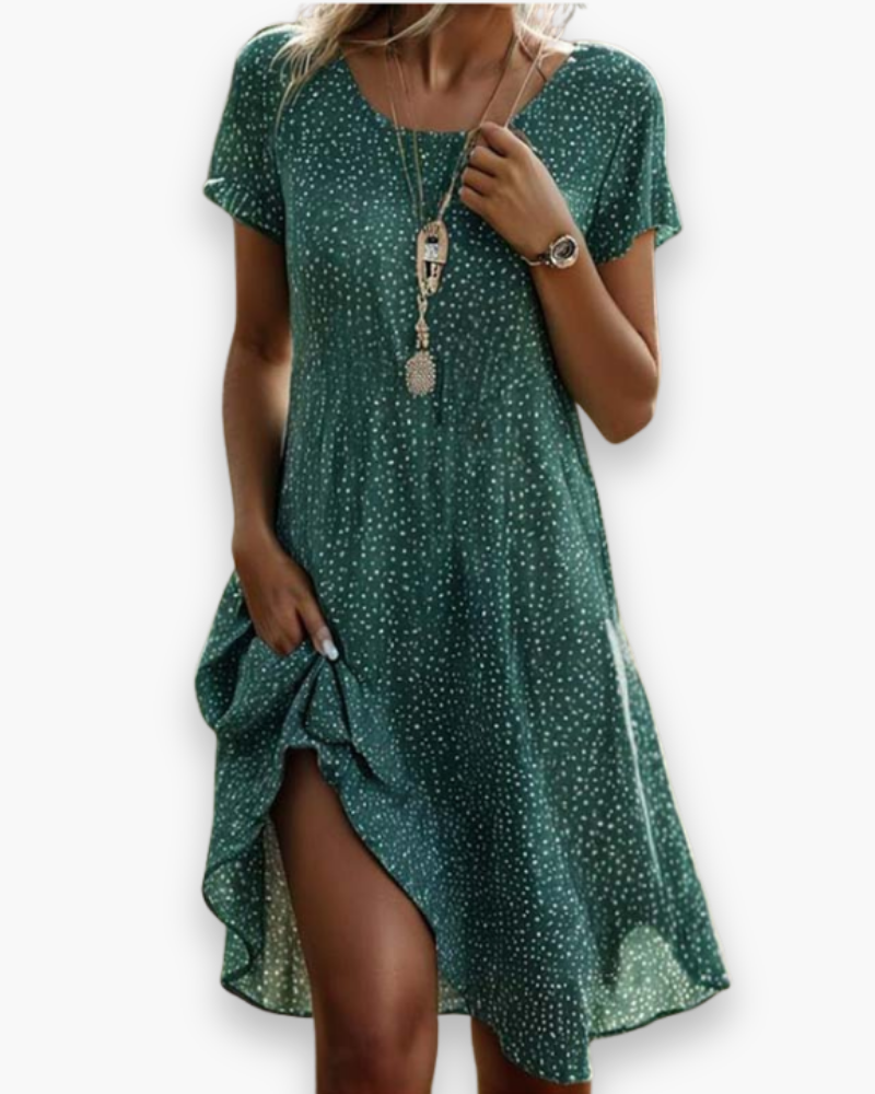 "Robe midi vintage élégante d'été pour femme, design rétro, tissu léger, idéale pour look estival chic et confortable."