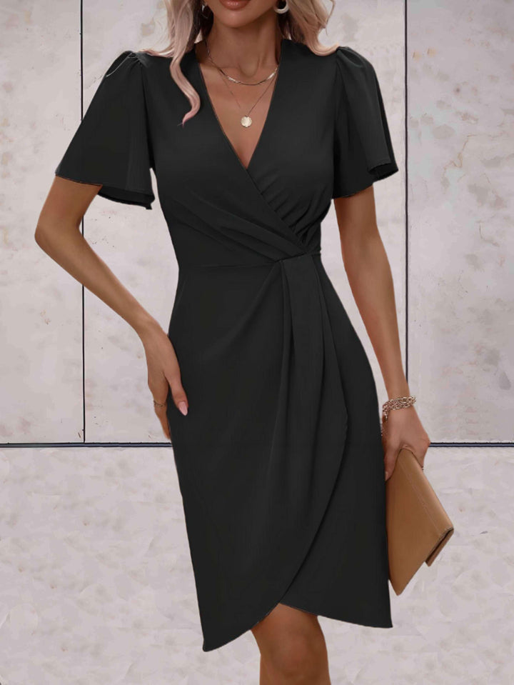 "Robe portefeuille femme V-col croisé, ajustable, élégante, soulignant les courbes, idéale pour toutes occasions."