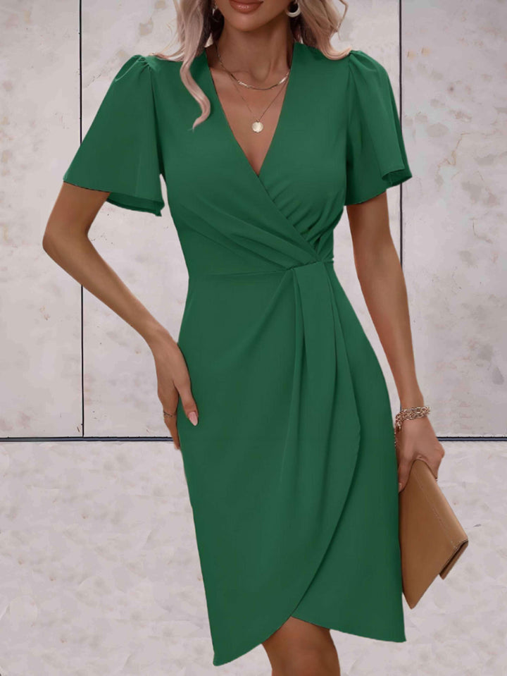 "Robe portefeuille femme V-col croisé, ajustable, élégante, soulignant les courbes, idéale pour toutes occasions."