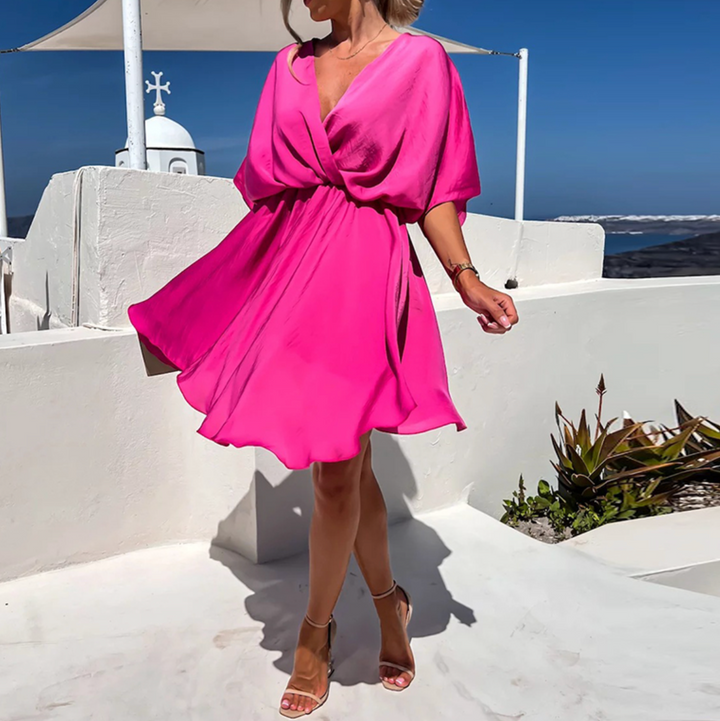 Robe rose femme en tissu doux et confortable. Élégance intemporelle pour la mode féminine.