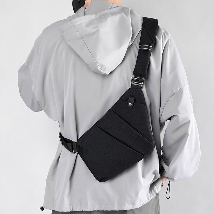 "Sac à bandoulière femme antivol, élégant, en tissu hydrofuge, design ergonomique, poches cachées, sécurité optimale."
