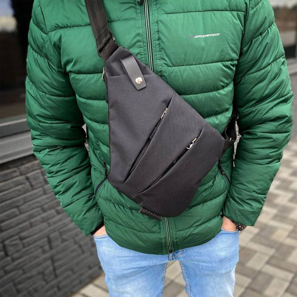 "Sac à bandoulière femme antivol, élégant, en tissu hydrofuge, design ergonomique, poches cachées, sécurité optimale."