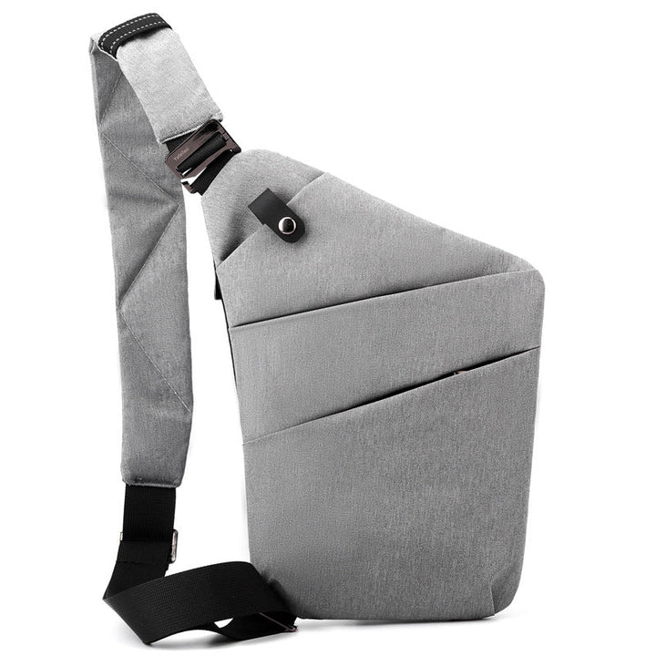 "Sac à bandoulière femme antivol, élégant, en tissu hydrofuge, design ergonomique, poches cachées, sécurité optimale."