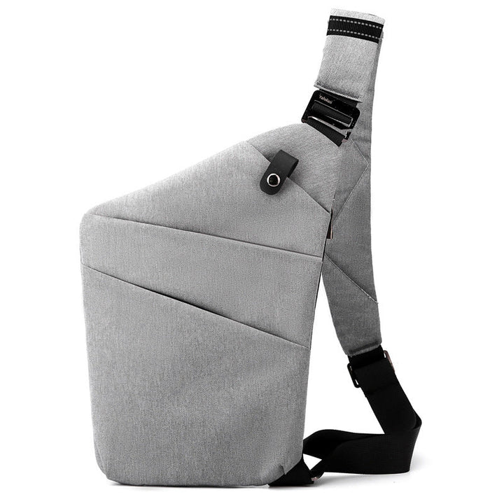 "Sac à bandoulière femme antivol, élégant, en tissu hydrofuge, design ergonomique, poches cachées, sécurité optimale."
