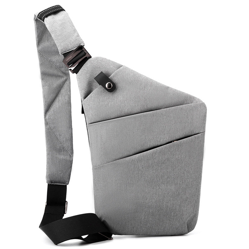 "Sac à bandoulière femme antivol, élégant, en tissu hydrofuge, design ergonomique, poches cachées, sécurité optimale."