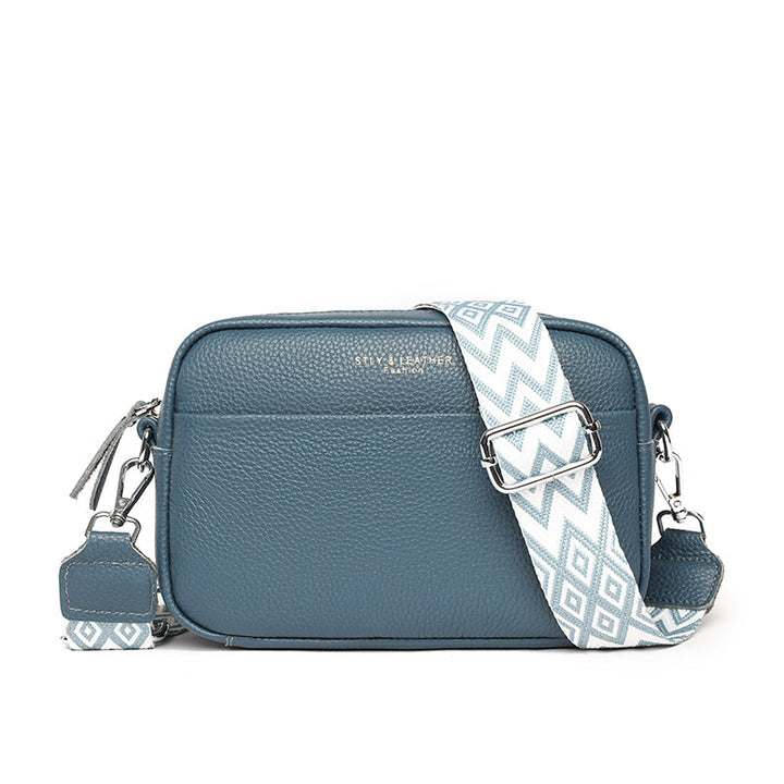 Sac à bandoulière femme en cuir.  Design chic et pratique.  Idéal pour le quotidien.