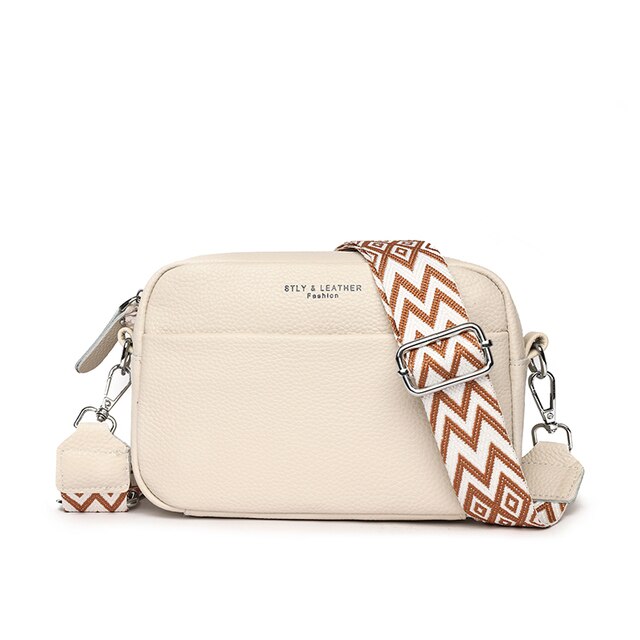 Sac à bandoulière femme en cuir.  Design chic et pratique.  Idéal pour le quotidien.