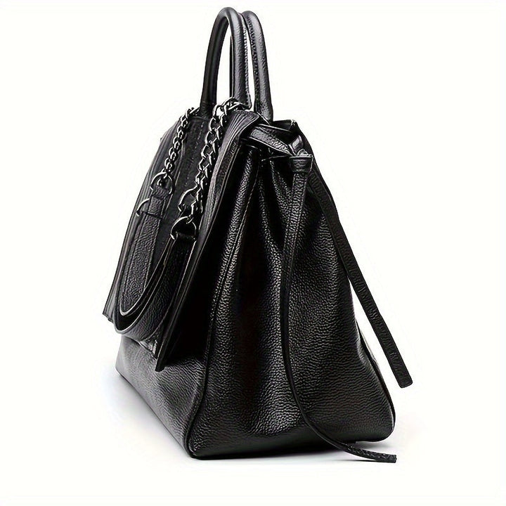 Sac à bandoulière noir élégant pour femmes, grand format avec compartiments, en cuir synthétique, style moderne chic.
