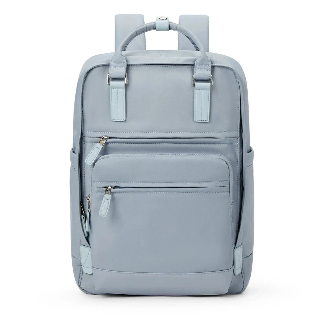 Sac à dos chic femme en nylon bleu, spacieux et élégant, idéal pour travail et voyages. Résistant et imperméable.