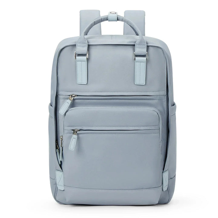 Sac à dos chic femme en nylon bleu, spacieux et élégant, idéal pour travail et voyages. Résistant et imperméable.