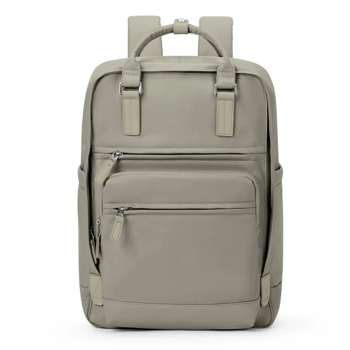 Sac à dos chic femme en nylon bleu, spacieux et élégant, idéal pour travail et voyages. Résistant et imperméable.