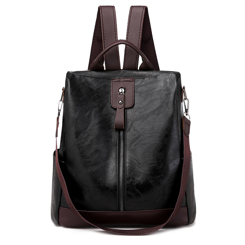 Sac à dos convertible en simili cuir, chic et pratique.  Design élégant, polyvalent, bretelles réglables.