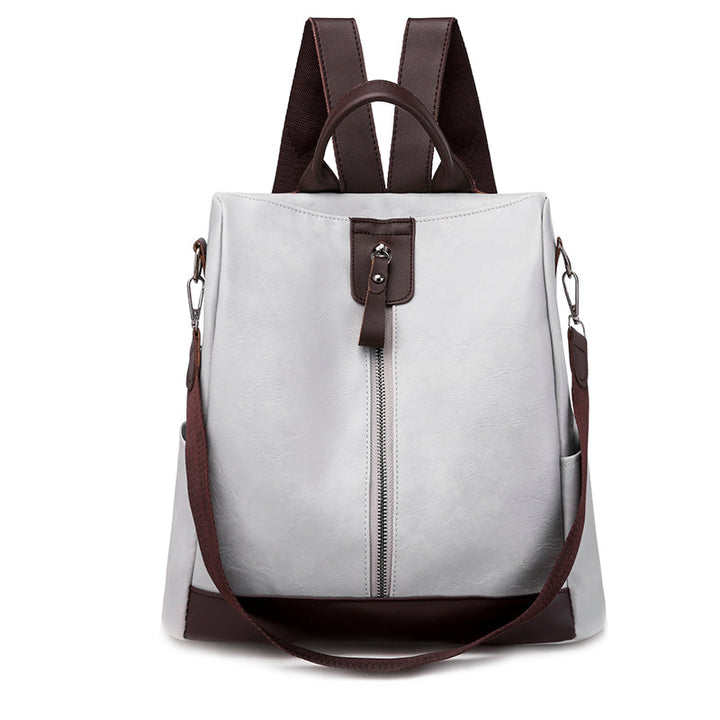 Sac à dos convertible en simili cuir, chic et pratique.  Design élégant, polyvalent, bretelles réglables.
