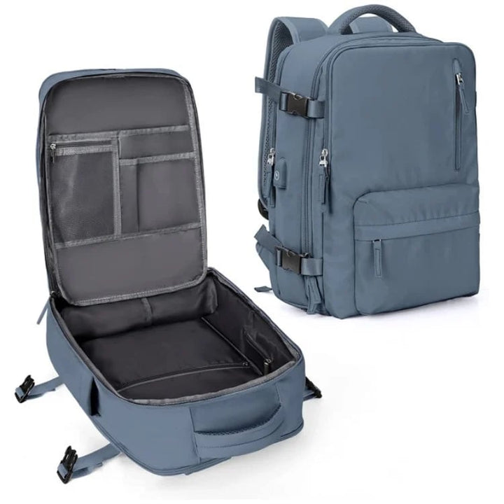 "Sac à dos imperméable bleu marine, grande capacité, avec port USB et design antivol pour voyager et randonnée."