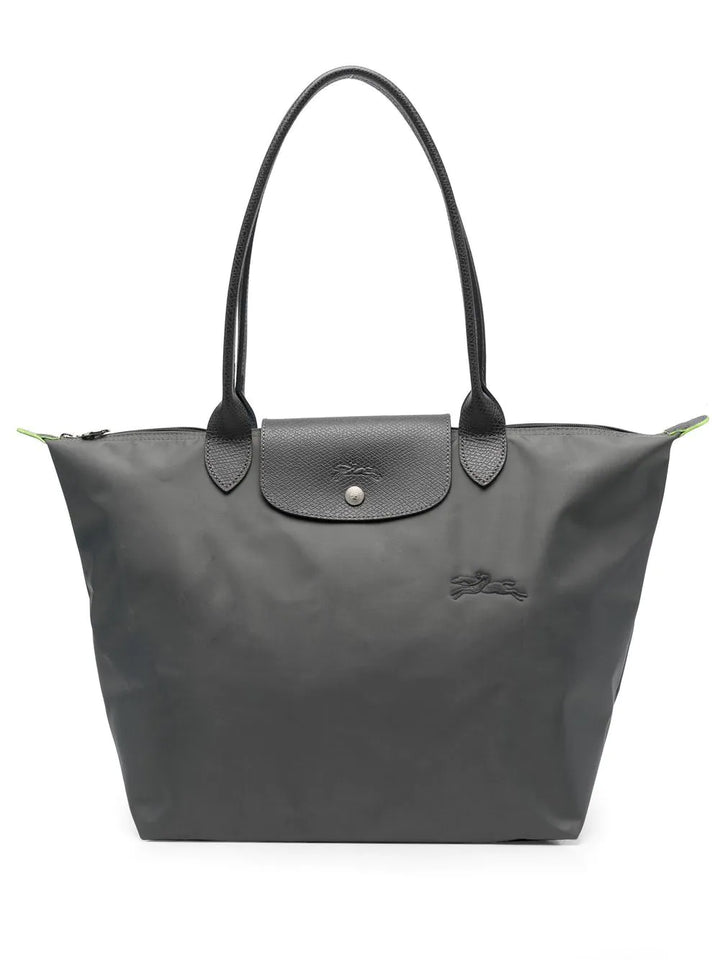 Élégant sac à main pliable, conçu pour la femme moderne, pratique pour le voyage et le quotidien.