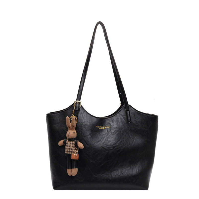 "Sac à main cuir végan Éléna, élégant et moderne, avec design épuré et intérieur spacieux pour femme."
