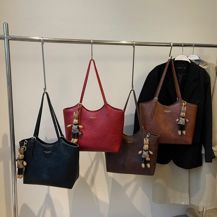 "Sac à main cuir végan Éléna, élégant et moderne, avec design épuré et intérieur spacieux pour femme."