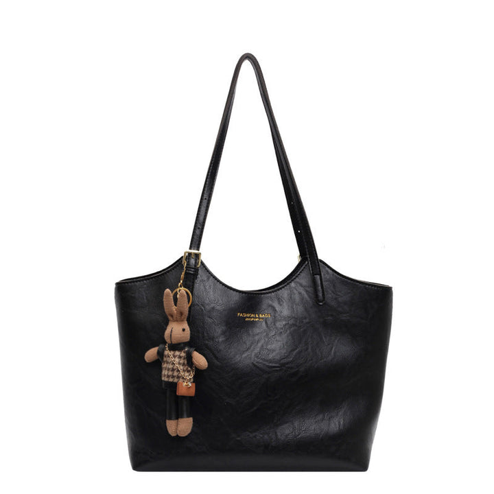 "Sac à main cuir végan Éléna, élégant et moderne, avec design épuré et intérieur spacieux pour femme."