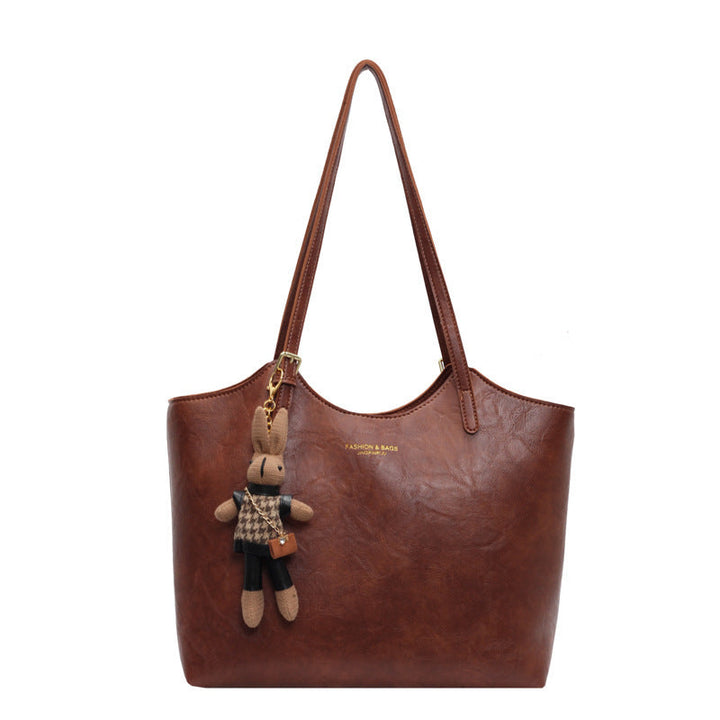 "Sac à main cuir végan Éléna, élégant et moderne, avec design épuré et intérieur spacieux pour femme."