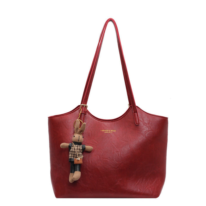 "Sac à main cuir végan Éléna, élégant et moderne, avec design épuré et intérieur spacieux pour femme."