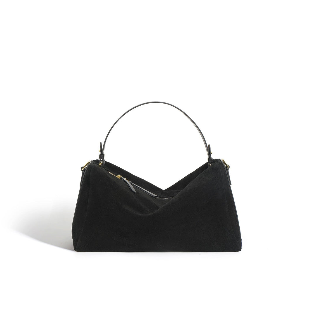 Sac à main élégant en cuir de vachette bicouche, couleur brune, avec anses renforcées et doublure en polyester.