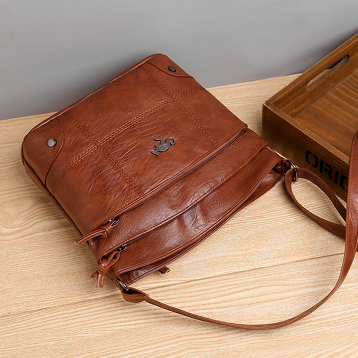 Sac à main élégant en simili cuir, petit modèle, idéal quotidien.  Accessoire mode polyvalent.