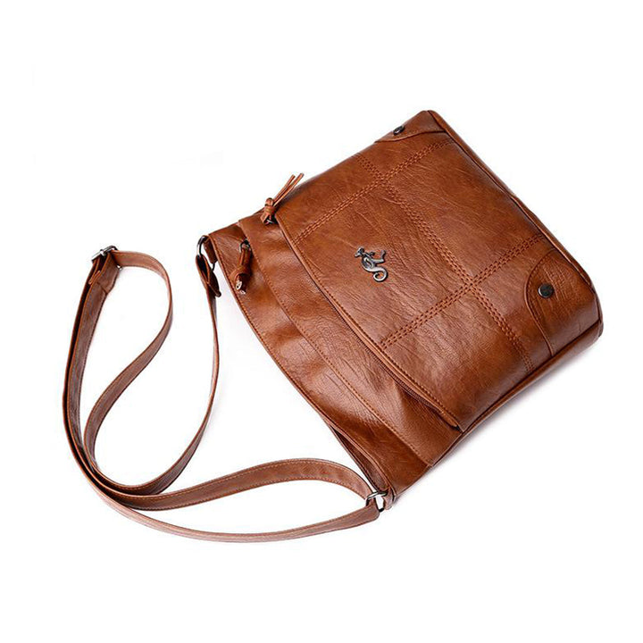 Sac à main élégant en simili cuir, petit modèle, idéal quotidien.  Accessoire mode polyvalent.