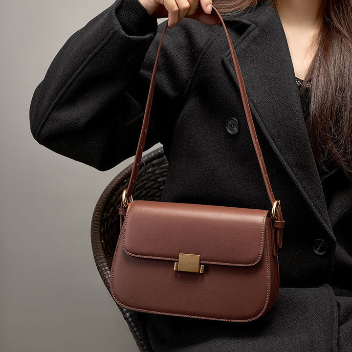 "Sac à main en cuir véritable NOXA, élégant, polyvalent, beige, bandoulière réglable, détails luxueux, féminin et chic."