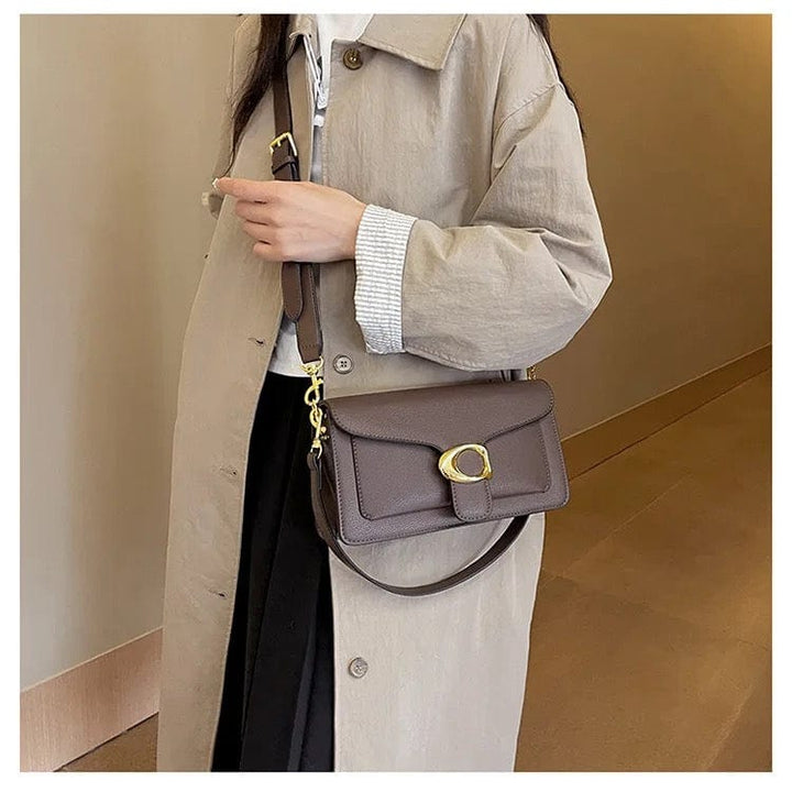Sac à main Jasmine élégant, structuré, avec bandoulière ajustable, détails raffinés, en couleurs variées pour femmes.