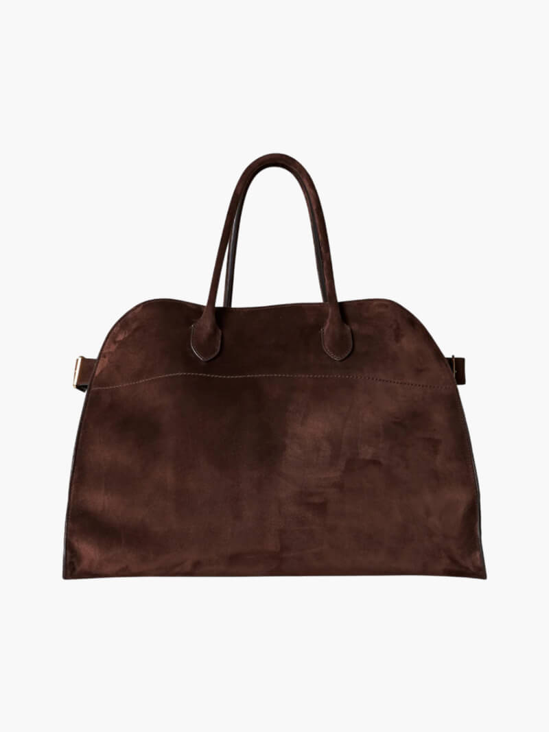 "Sac à main luxe automnal en daim végan, design élégant avec bandoulière ajustable pour femmes."
