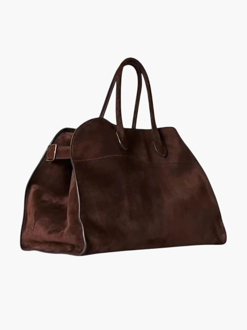 "Sac à main luxe automnal en daim végan, design élégant avec bandoulière ajustable pour femmes."