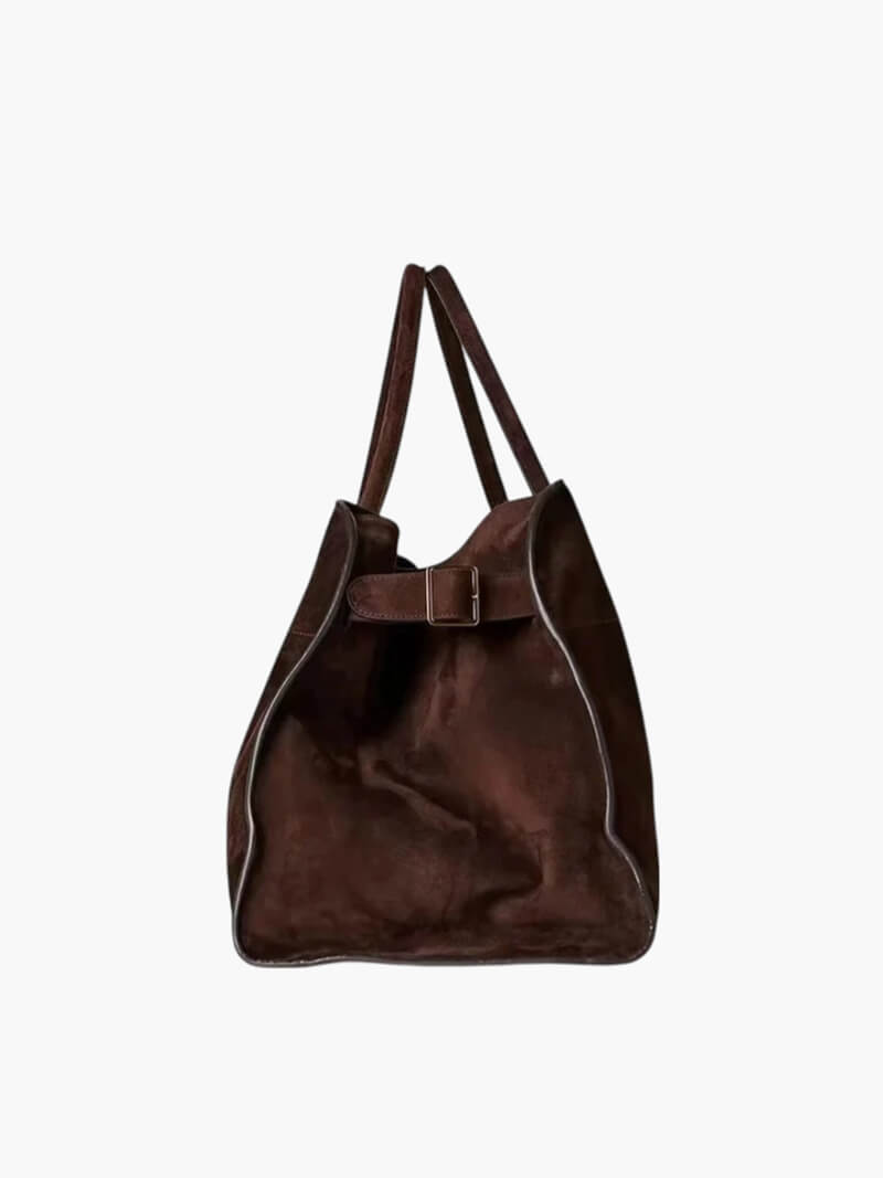 "Sac à main luxe automnal en daim végan, design élégant avec bandoulière ajustable pour femmes."