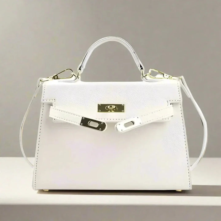 "Sac à main luxe femme, élégant et pratique, en cuir, noir et blanc, avec détails raffinés, polyvalent et spacieux"