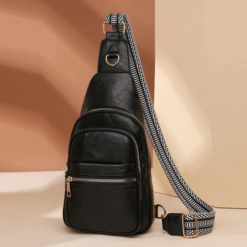 Sac banane bandoulière femme moderne en cuir PU noir, accessoire mode élégant pour poitrine ou taille.