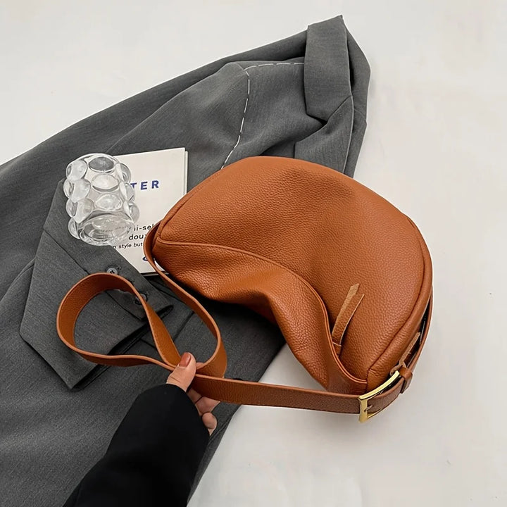 Sac banane élégant femme, un indispensable pour un look tendance, alliant praticité et design chic.