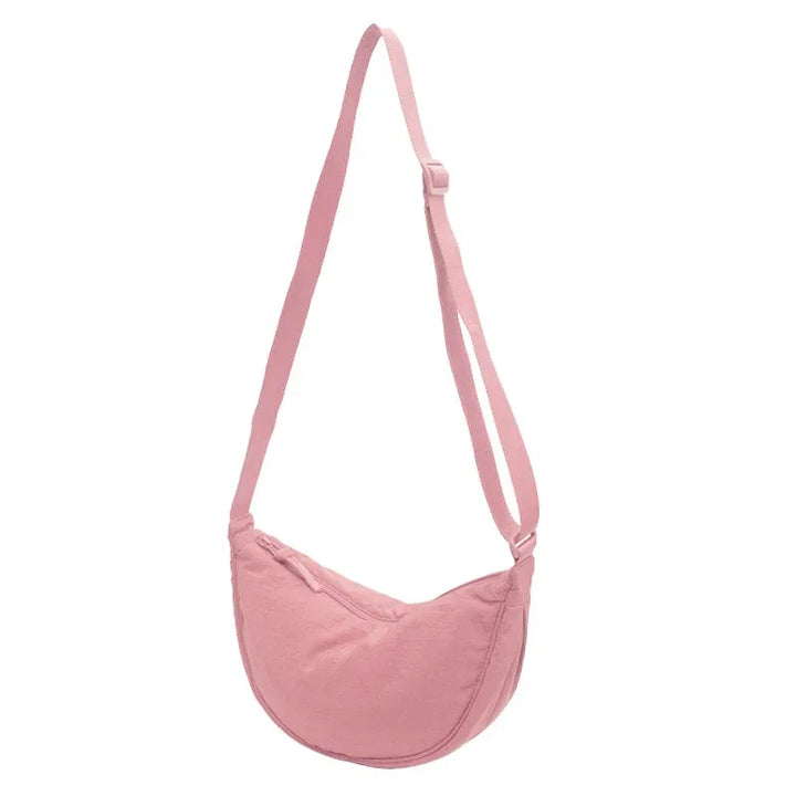 Sac banane bandoulière femme léger, accessoire indispensable pour un quotidien pratique et stylé.
