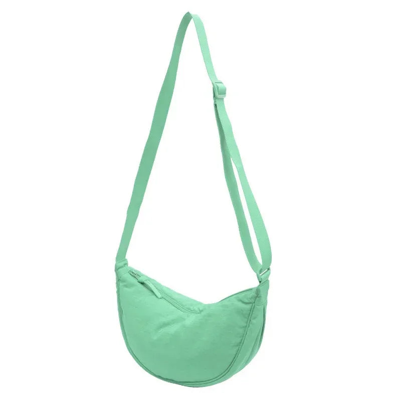 Sac banane femme bandoulière, compact et léger pour le voyage, garde vos affaires en sécurité.
