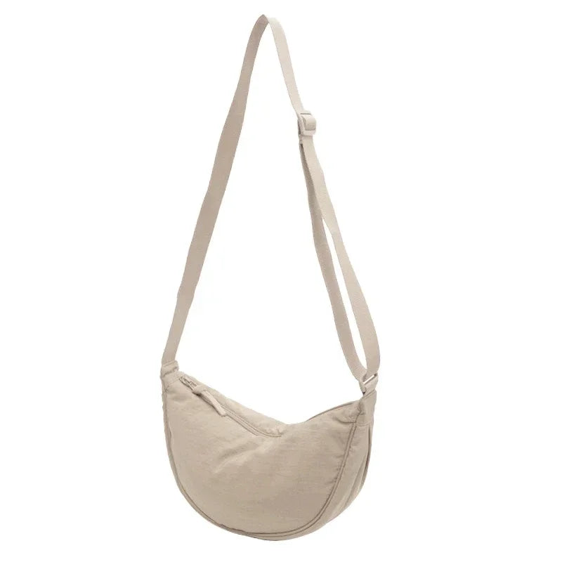 Sac banane femme ultra-léger en nylon imperméable, bandoulière ajustable, idéal pour le voyage.