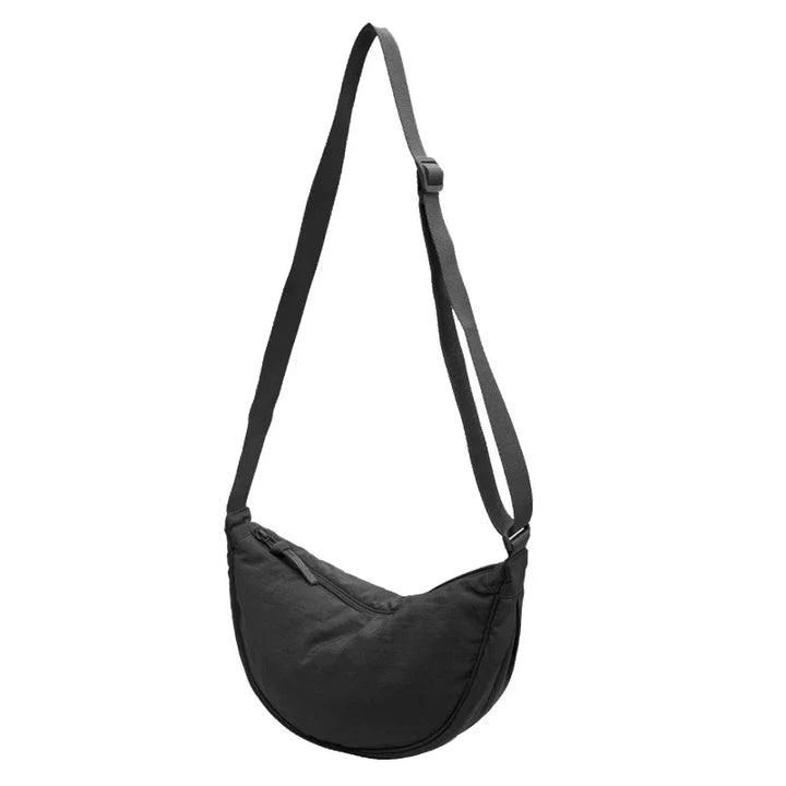 Sac banane pratique femme bandoulière, multiples compartiments, léger pour un usage quotidien.