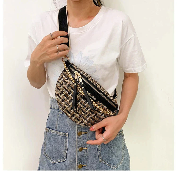 Sac banane femme noir en tissu robuste et cuir PU, un choix intemporel et chic pour toutes les occasions.