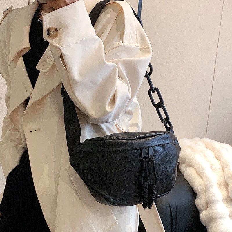 Sac banane femme en cuir PU, couleur marron foncé, idéal pour un look décontracté-chic.
