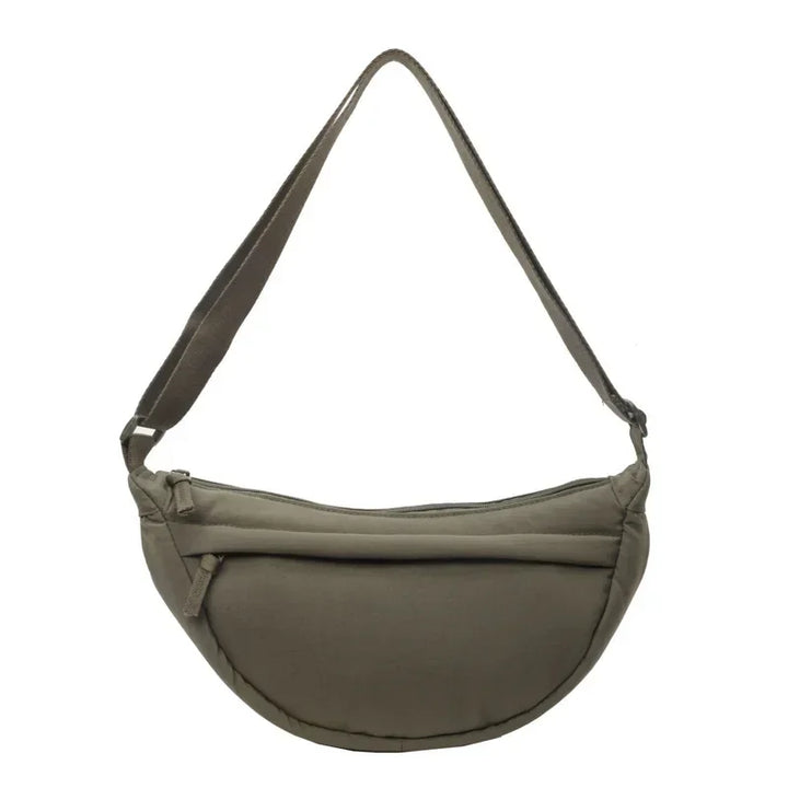 Sac banane femme tendance en nylon, accessoire indispensable pour compléter votre tenue mode et pratique.
