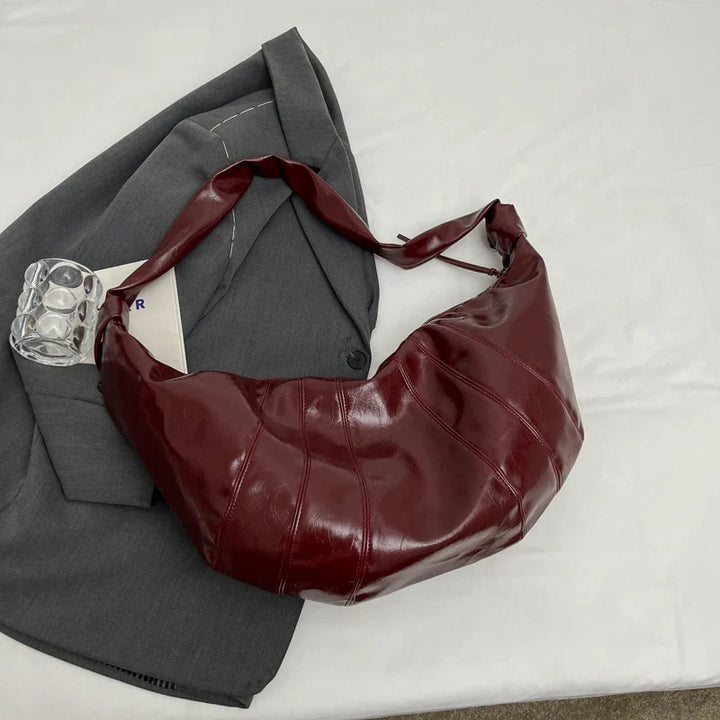 Sac banane en similicuir, accessoire mode femme chic et tendance pour toutes occasions.