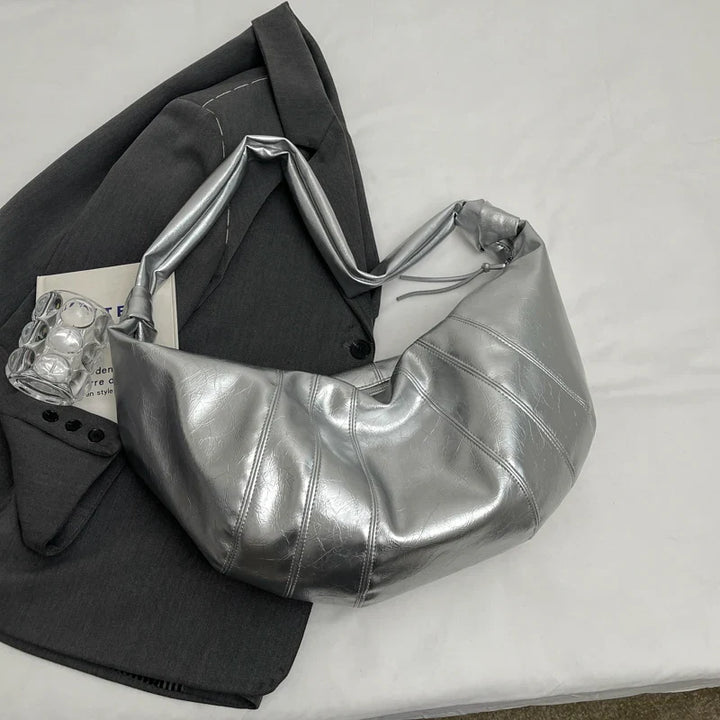 Sac banane chic pour femme en similicuir, rehausse votre tenue avec style et élégance.