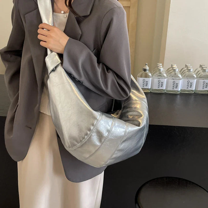 Sac banane grand format femme, idéal pour une organisation facile et un look mode.