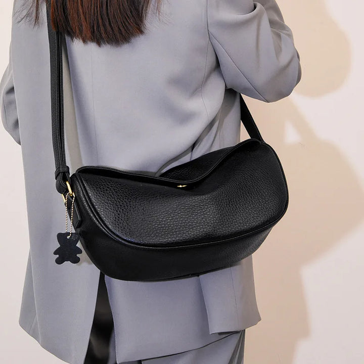 Sac banane chic pour femme, en cuir, polyvalent, style bandoulière pour voyage.